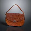 Brown Leather Handbag With Carved Floral Patterns And Metal Clasp