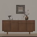 Natural Wood Console Cabinet And Sideboard With Decorative Vase Sculpture Framed Art And Ornamental Details