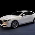 White Mazda Sedan Featuring Modern Sleek Body And Alloy Wheels On Blue