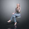 Woman With Pink Hair Wearing Lace Top And Jeans Sitting On Chair Talking On Phone