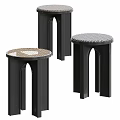 Modern Black Side Tables With Arched Legs And Round Textured Tops