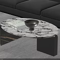 Oval Marble Coffee Table With Black Legs Brown Bowl And White Book In Living Room