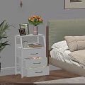 White Tiered Storage Shelf in Bedroom with Vase Flowers Photo Frame Alarm Clock and Books