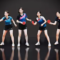 Four Women in Sportswear Holding Table Tennis Rackets Striking Dynamic Hitting Poses Against Black Background
