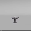 Gray Padded Stool with Unique Curved Design and Open Notebook on Top