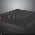 Gray Rectangular Industrial Device With Red Indicator Light Metal Casing And Interface Ports