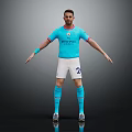 Man in Manchester City Blue Shirt White Shorts Number 2 with Blue Socks Grey Background