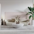 Modern Beige Sofa And Round Coffee Table Set With Dried Flowers And Large Green Plant