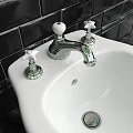 Modern Toilet And Bidet Design With Black Tiled Wall And Marble Floor