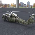 Military Helicopter With Camouflage Paint Parked On Gray Ground Featuring Main Rotors And Tail Rotor
