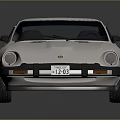 Vintage White Two Door Sports Car With Black Roof And Hood Vents