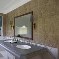 Elegant Bathroom Vanity With Double Sink Large Mirror Stone Wall And Decorative Plants