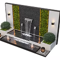 Contemporary Water Fountain With Green Living Wall Flowing Water Wall Lights And Small Shrubs