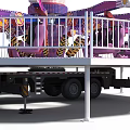 Vibrant Amusement Ride With Spinning Arms Passenger Seats Staircase And Safety Railing