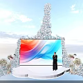 Elegant Stage Featuring Large Colorful Screen Person in Black Blue Floral Decorations and Sky Background