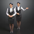 Two Female Service Staff In Black And White Uniform Standing With Hand Gesture