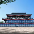 Two Story Chinese Style Building With Red Decoration Balcony Waterfront Square And City Skyline