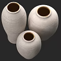 Three Gray Ceramic Vases with Floral Patterns and Textured Designs in Various Sizes