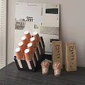 Orange Paper Cups In Black Holder With Clear Plastic Cups Pasta Bags And Wall Art