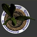 Green Plant With Long Leaves In Wicker Basket On Blue White Saucer Against Gray Background