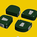 Four Green Square Industrial Devices Featuring Metal Components And Rectangular Design