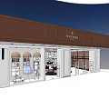 Modern Fashionable Clothing Store Exterior With Illuminated Window Displays And Mannequins