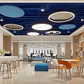 Bright Modern Office Lounge Area With Colorful Modular Sofas Next To Open Workstations