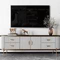 Modern White Black TV Stand with Gold Legs Deer Figurine Vase and Books