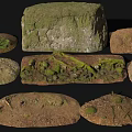 Collection Of Ground Stones In Various Shapes With Moss Textures