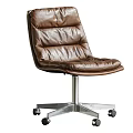 Brown Leather Office Chair With Tufted Design And Silver Metal Base On Wheels