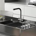 Stainless Steel Double Bowl Kitchen Sink With Black Faucet Glass Rack And White Cabinets