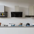 Different Types Of Modern Kitchen Appliances Including Range Hoods And Gas Stoves