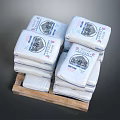 White Household Product Bags Stacked on Wooden Pallet With Labels and Patterns