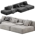 Gray And Beige Sectional Sofa With Decorative Pillows And Throw Blanket 3d model
