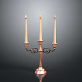 Brass Candelabra With Three Lit Candles And Ornate Design On Dark Background