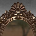 Ornate Oval Decorative Mirror With Carved Metal Frame And Grey Wall Background