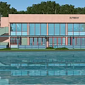 Pink Exterior Boutique Guesthouse Building With Large Glass Windows Surrounded By Trees And Pool Reflection