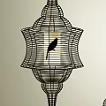 Black Metal Wire Frame Lantern Shaped Chandeliers With Small Bird Accents Hanging Against Light Wall