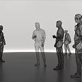 Human Shaped Art Installation With Black And White Standing Figures On Smooth Gray Floor