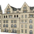 Classic European Architecture With Tall Spire Arched Windows And Stone Exterior Design