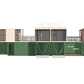 Multi Storey Container Building With Green And Beige Modules Balconies And Large Windows