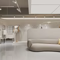 Stylish Modern Clothing Store Interior With Clothing Racks Display Table And Green Plants