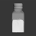 Clear Glass Salt Shaker With Perforated Lid Filled With White Table Salt For Kitchen Use