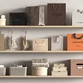 Elegant Assorted Bags And Boxes Displayed On Shelves With Various Designs And Styles