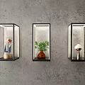 Modern Square Wall Lamps With Decorative Sculpture Plant And Sphere On Textured Gray Wall