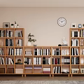 Wooden Multi Tiered Bookcase With Shelves Books Decorative Items Green Plant And Wall Clock