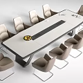 Modern Office Desk With Light Surface Dark Stripe Surrounded By Beige Chairs And Fruit Bowl
