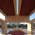 Modern Architectural Courtyard With Pool Statue Grass And Blue Sky