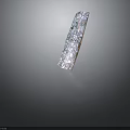 Plant Fossil Embedded Transparent Crystal Bar with Colorful Textures on Dark Background