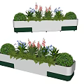 White Flower Planters With Green Accents Holding Various Red Blue Blooms Bushes And Ferns